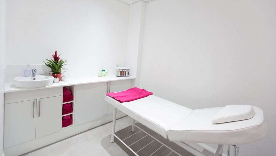 Relaxing treatment room at Muskaan Nails & Beauty Leicester in Leicester, England, GB with a massage bed.