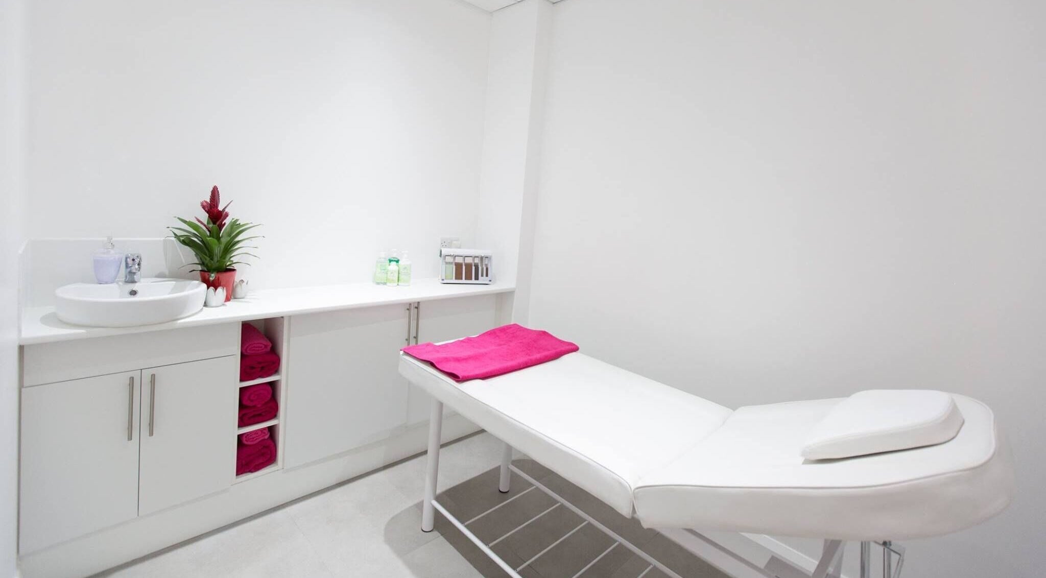 Relaxing treatment room at Muskaan Nails & Beauty Leicester in Leicester, England, GB with a massage bed.