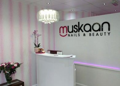 Reception area at Muskaan Nails & Beauty Leicester in Leicester, England, GB with chic decor and floral accents.