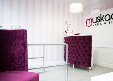 Elegant reception area at Muskaan Nails & Beauty Leicester, Leicester, England, GB with plush purple decor.