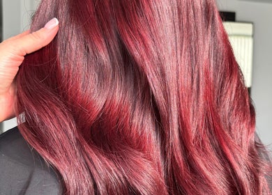 Rich crimson hair styled at Ashleah Marie Hairdressing in Stirling, Scotland, GB.
