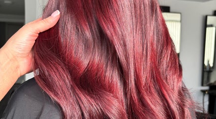 Rich crimson hair styled at Ashleah Marie Hairdressing in Stirling, Scotland, GB.