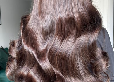 Glossy brown waves styled at Ashleah Marie Hairdressing, Stirling, Scotland, GB.