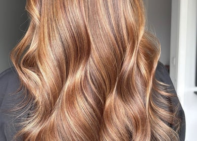 Beautiful wavy golden brown hair styled at Ashleah Marie Hairdressing in Stirling, Scotland, GB.