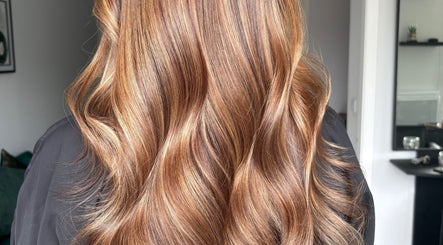Beautiful wavy golden brown hair styled at Ashleah Marie Hairdressing in Stirling, Scotland, GB.