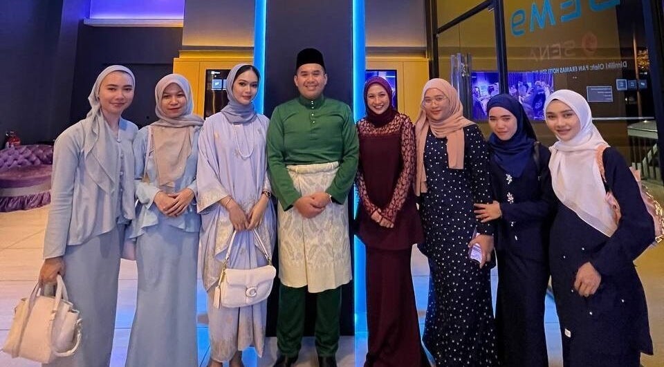 Stylish group at Beylla Medispa Kluang, Kluang, Johor, MY, showcasing vibrant attire and smiles.