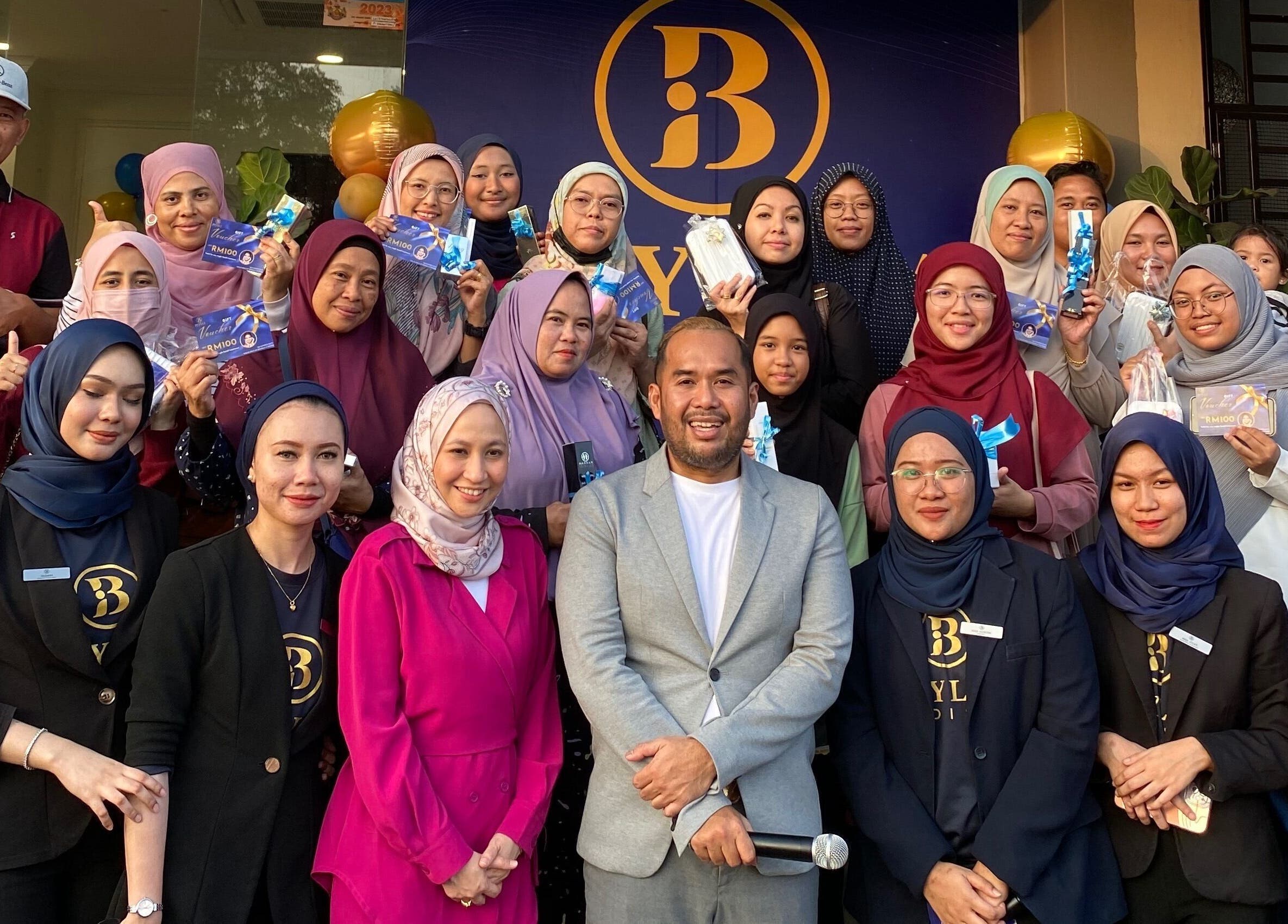 Group of smiling staff and attendees at Beylla Medispa Kluang, Kluang, Johor, MY event.