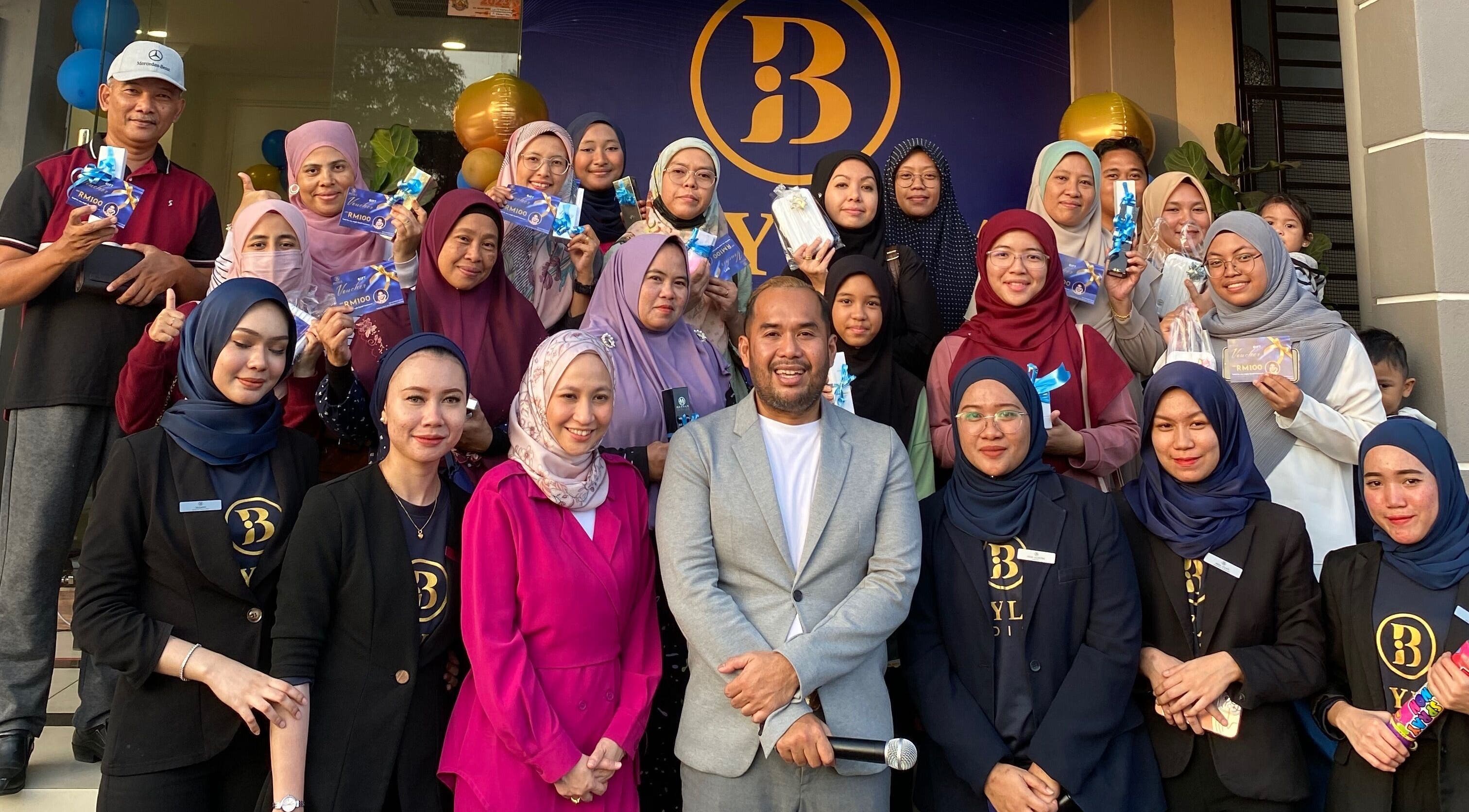 Group of smiling staff and attendees at Beylla Medispa Kluang, Kluang, Johor, MY event.