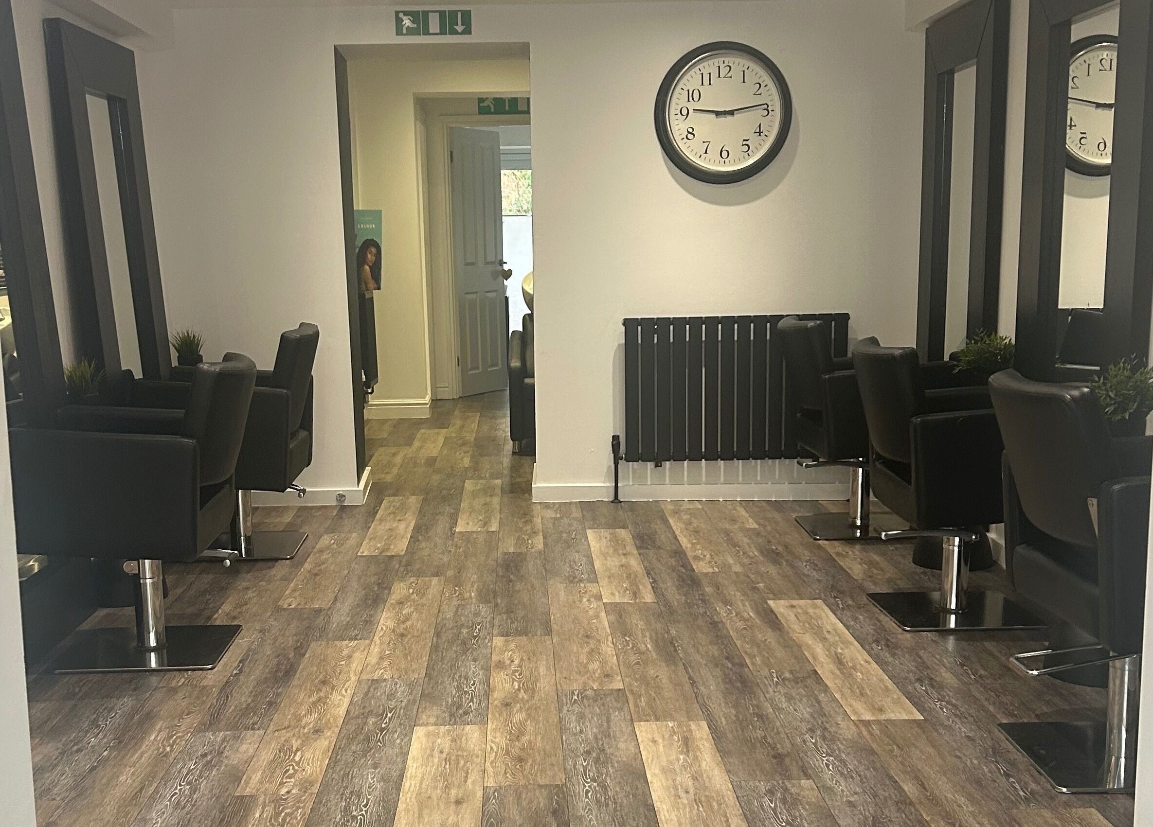 Modern salon chairs and mirrors at Hair and Beauty Gallery, Blackburn, England, GB.