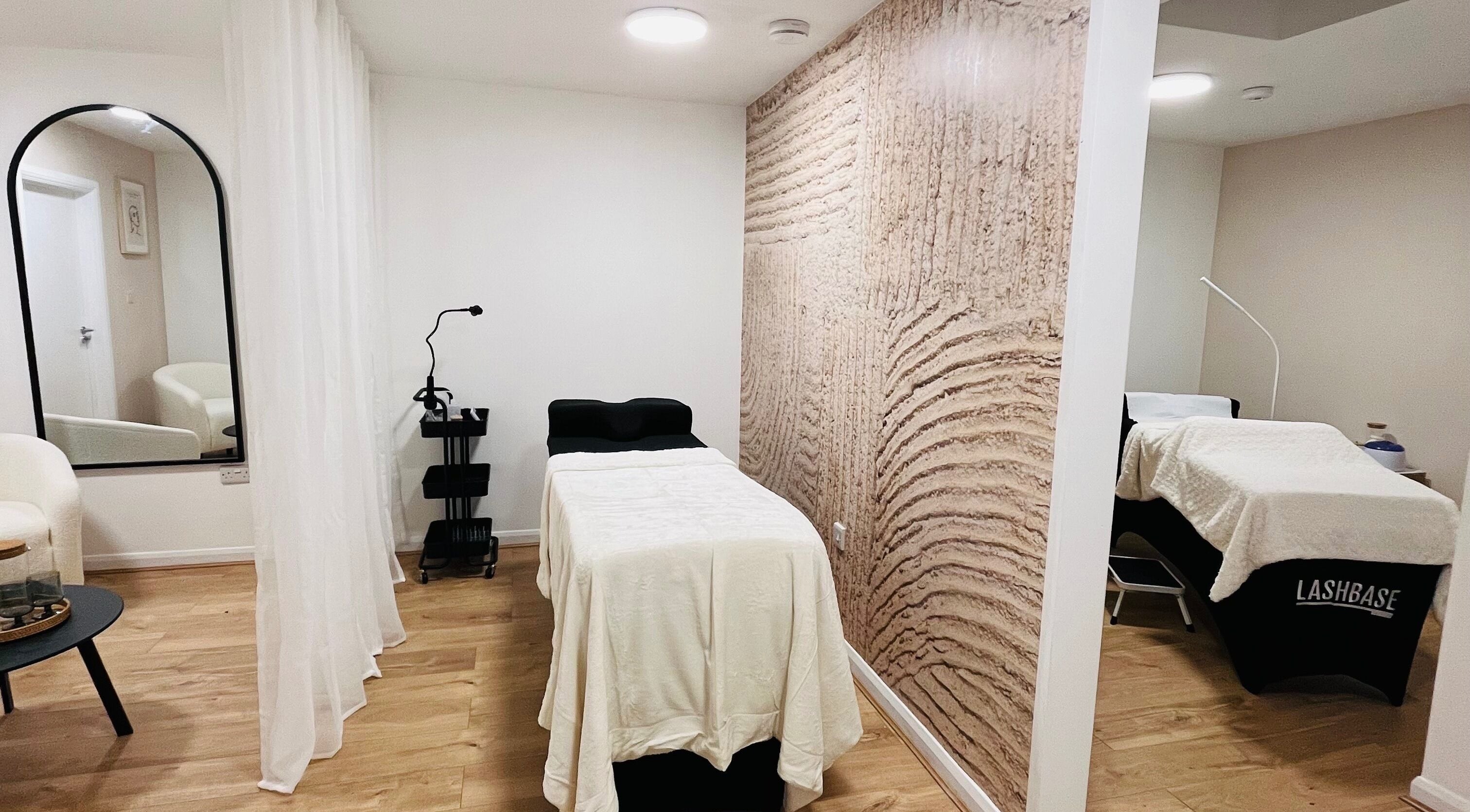 Tranquil therapy room at Lashed in London, London, England, GB with elegant decor and massage tables.