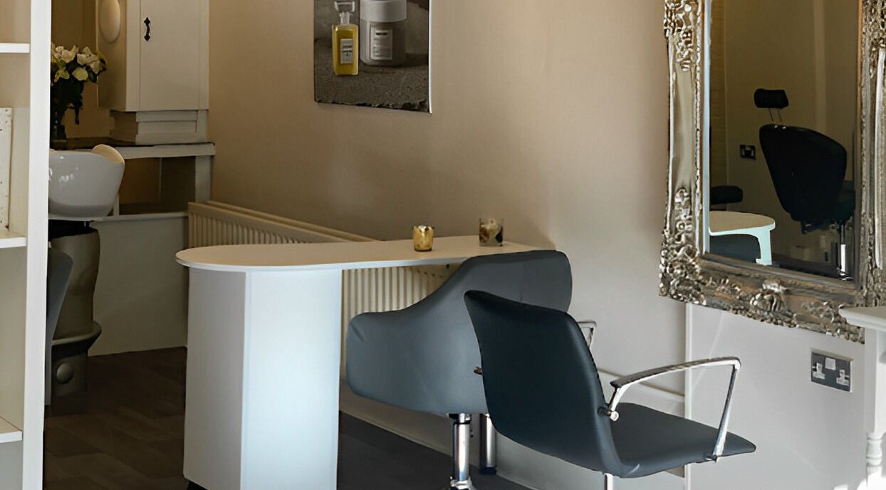 Chic seating area with a mirror at LD Beauty Suite, Bangor, Northern Ireland, GB.