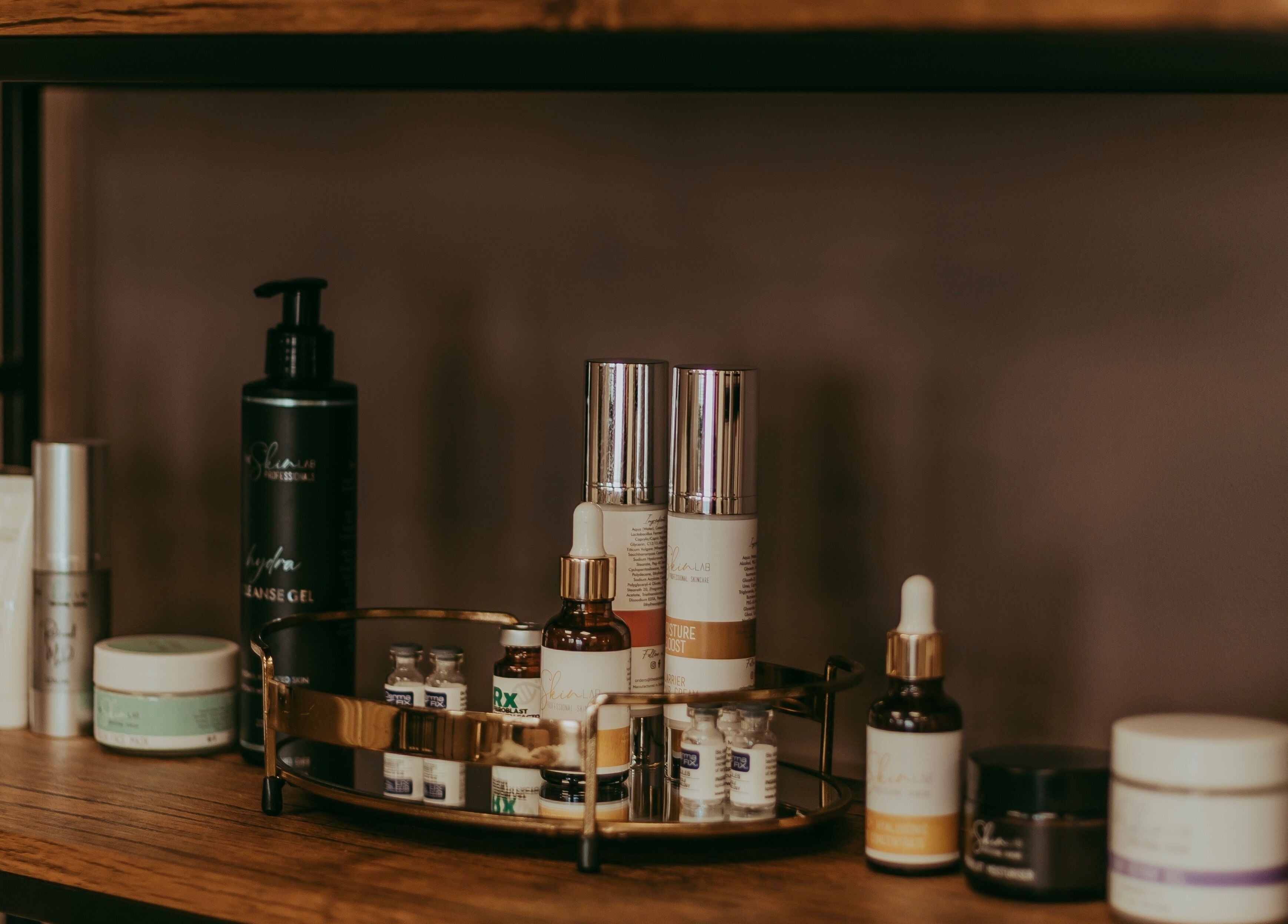 Luxurious skincare products on wooden shelf at Haven Spa Namibia, Windhoek, Khomas Region, NA.