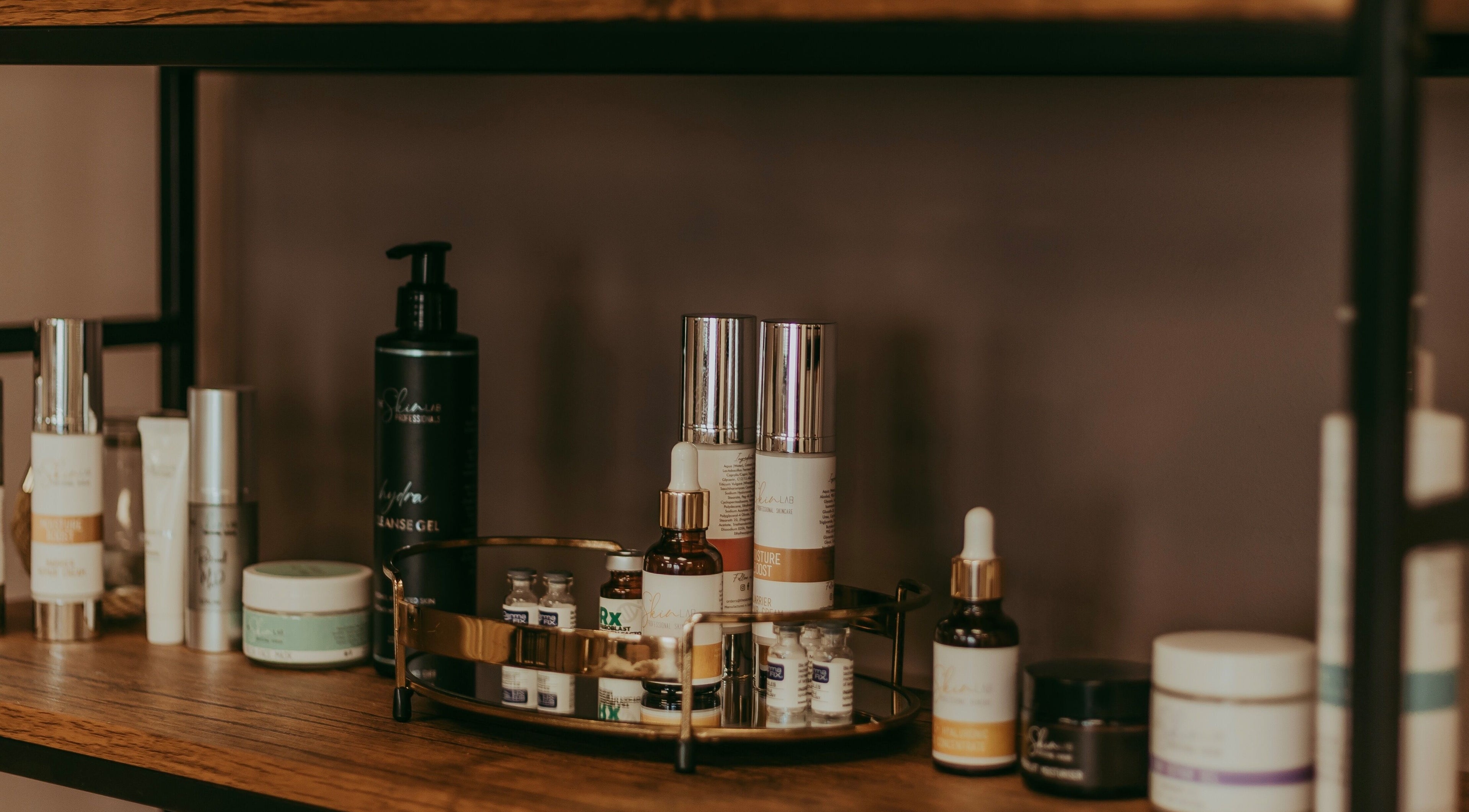 Luxurious skincare products on wooden shelf at Haven Spa Namibia, Windhoek, Khomas Region, NA.