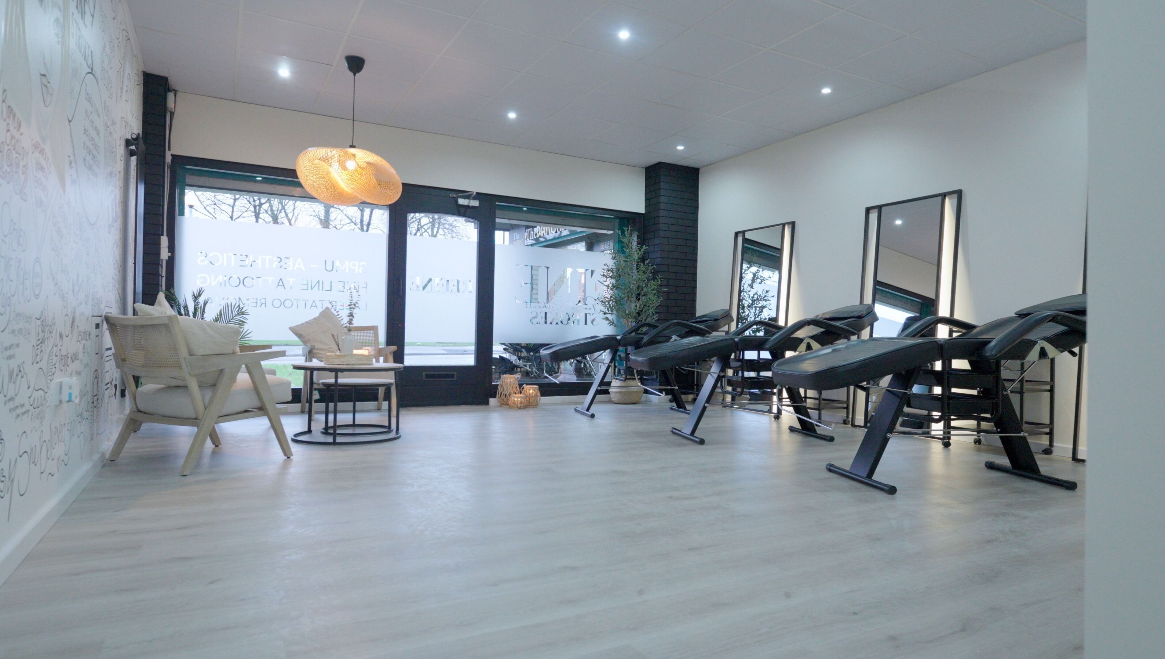 Fine Strokes SPMU and Aesthetics in Chadderton, England, GB featuring sleek treatment chairs and decor.