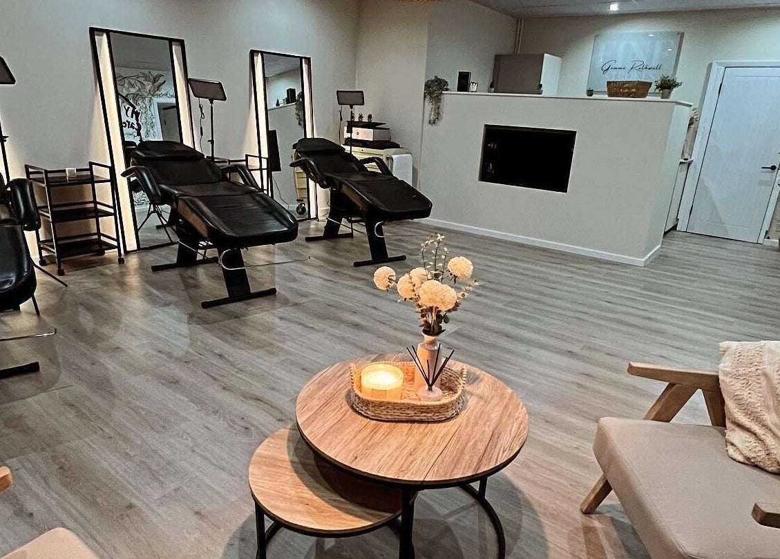 Modern interior of Fine Strokes SPMU and Aesthetics, Chadderton, England, GB showcasing stylish spa chairs and decor.