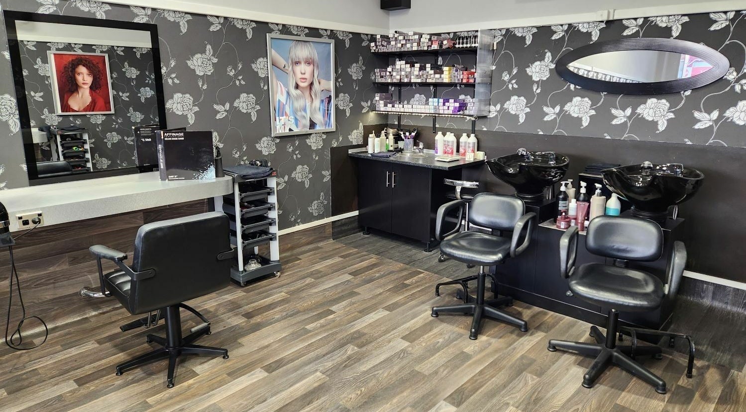 Modern salon interior of Chris and Co Hair Design in Pukekohe, Auckland, NZ showcasing stylish decor and equipment.