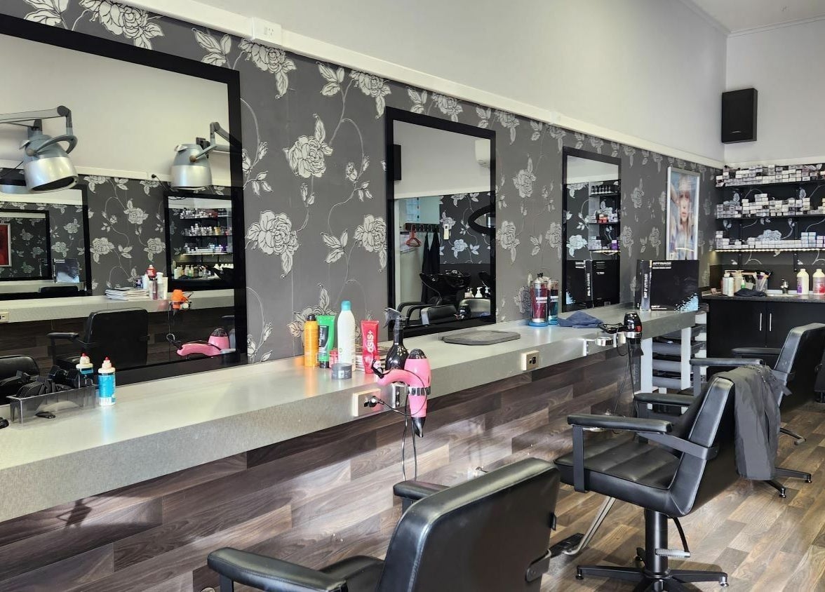 Modern styling chairs and mirrors inside Chris and Co Hair Design, Pukekohe, Auckland, NZ.