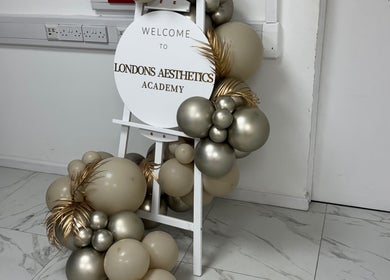 Elegant balloon display welcomes visitors to Levi Kimberley Aesthetics in West Drayton, England, GB.