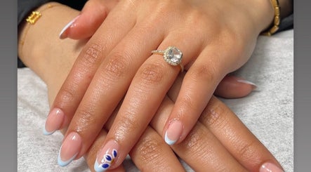 Stylish nail art with a diamond ring at Naya Saloon, Sanabis, Muḥāfaẓat Al-ʿāṣimah, BH.