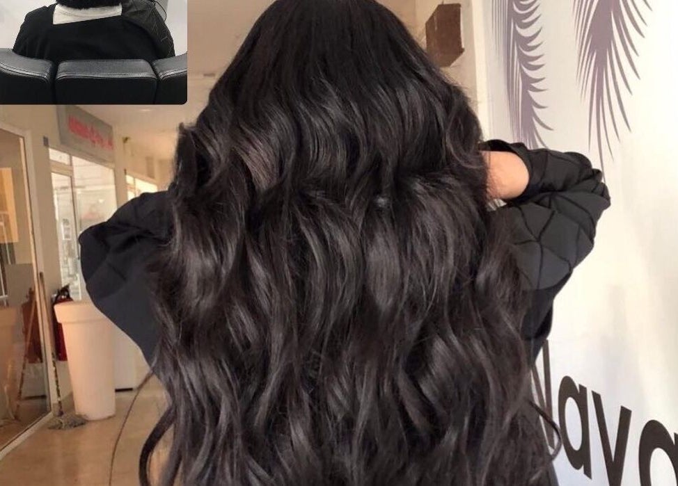 Elegant long hair styled at Naya Saloon, Sanabis, Muḥāfaẓat Al-ʿāṣimah, BH showcasing beautiful waves.