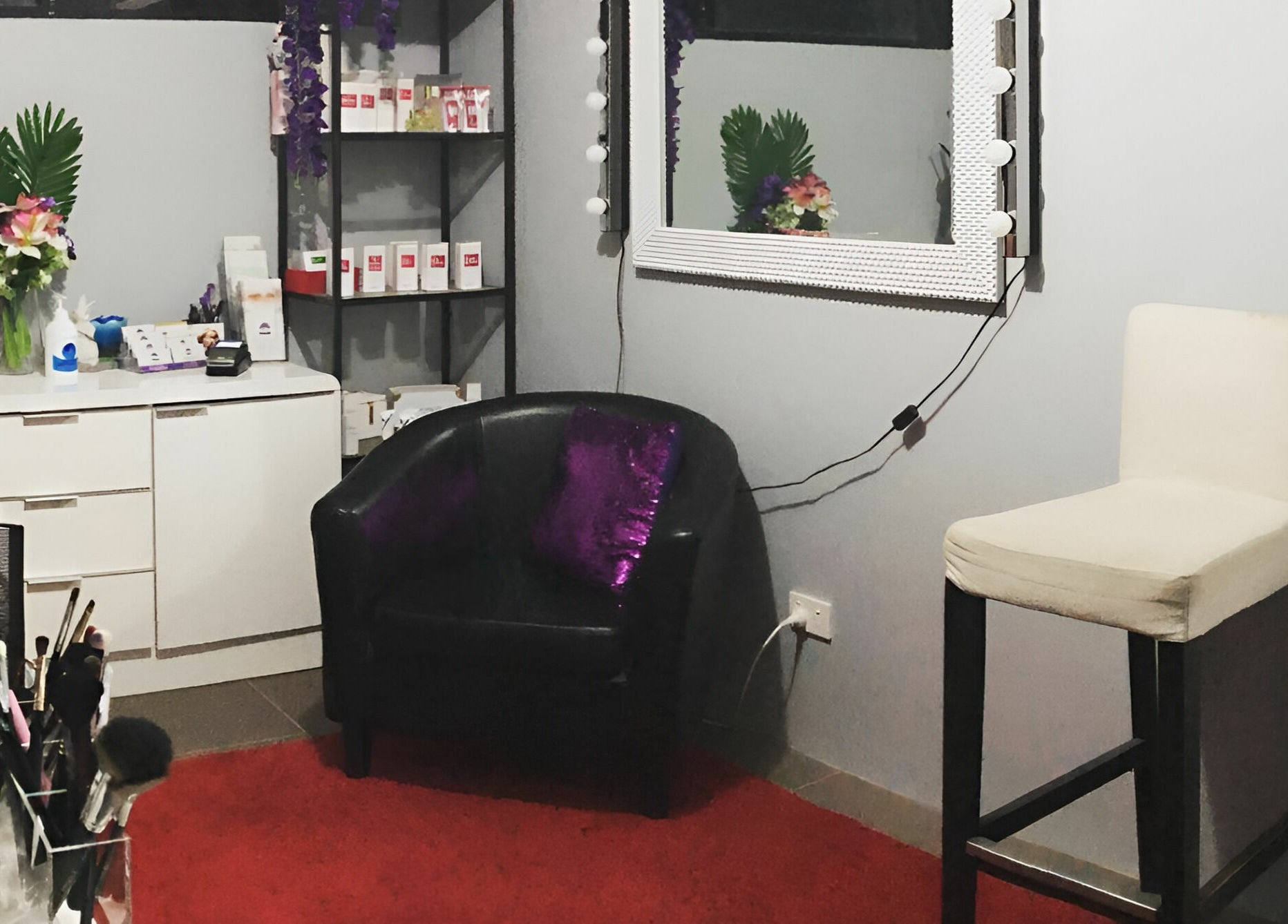 Chic interior of Northern Beauty Bullsbrook, Bullsbrook, Western Australia, AU with makeup setup and seating.