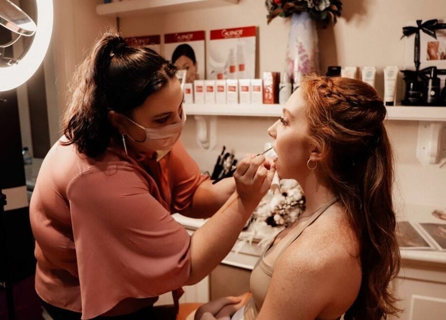Makeup session at Northern Beauty Bullsbrook, Bullsbrook, Western Australia, AU. Beauty artist applies product.