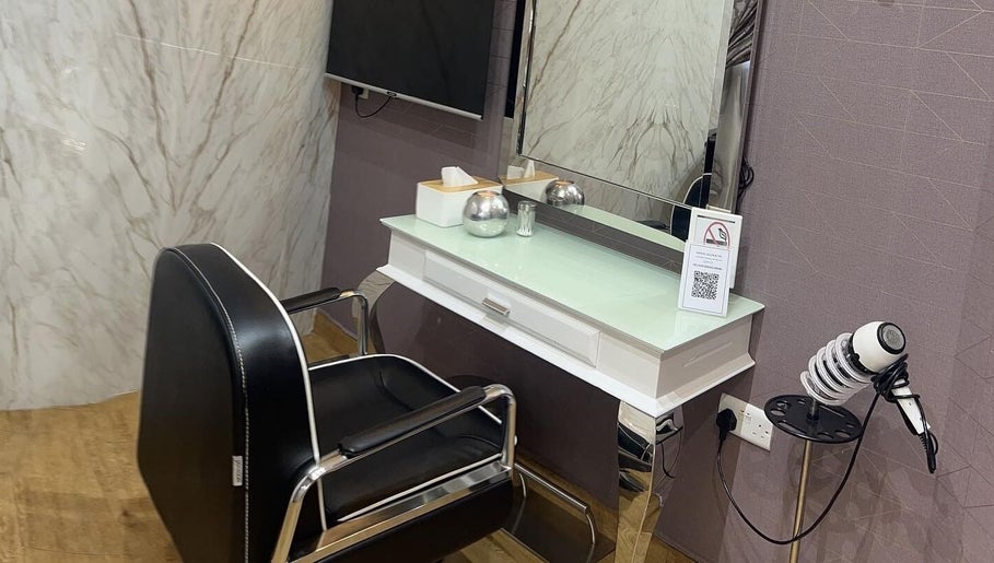 Modern salon station at Marcel Beauty Salon & Spa in Salmiya, Hawalli Governorate, KW, featuring sleek design.