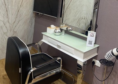 Modern salon station at Marcel Beauty Salon & Spa in Salmiya, Hawalli Governorate, KW, featuring sleek design.
