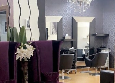 Chic interior of Marcel Beauty Salon & Spa in Salmiya, Hawalli Governorate, KW, featuring luxury chairs and mirrors.