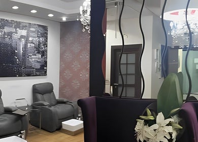 Chic interior of Marcel Beauty Salon & Spa with plush chairs in Salmiya, Hawalli Governorate, KW.