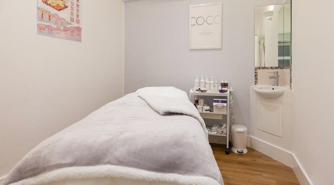 Serene treatment room at Farrah Brows & Aesthetic at SkinFit Clinic, Hampton, England, GB, offering relaxation.