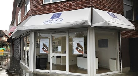 Front view of Farrah Brows & Aesthetic at SkinFit Clinic, Hampton, England, GB showcasing modern storefront design.