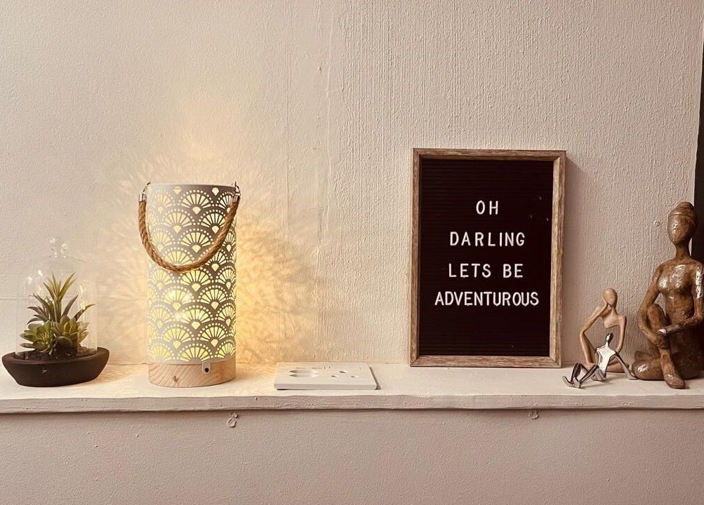 Elegant shelf at Chelle Aesthetic & Beauty Specialist, Cape Town, Western Cape, ZA, with decor and inspiring message.