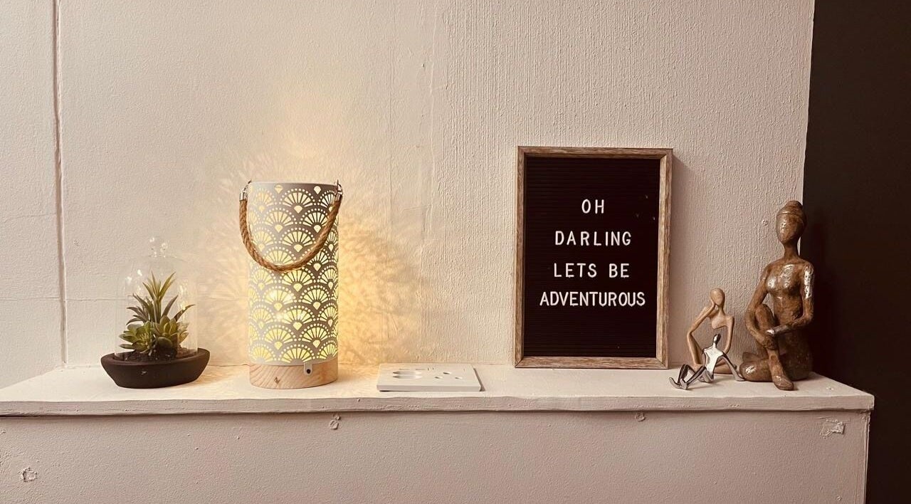 Elegant shelf at Chelle Aesthetic & Beauty Specialist, Cape Town, Western Cape, ZA, with decor and inspiring message.