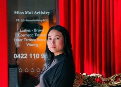 Interior of Miss Mai Artistry and Co, Mount Evelyn, Victoria. Red curtains and stylish decor.