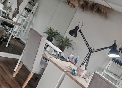 Elegant nail studio at Silk Skin & Wellness Clinic, Hoveton, England, GB, featuring well-lit manicure stations.