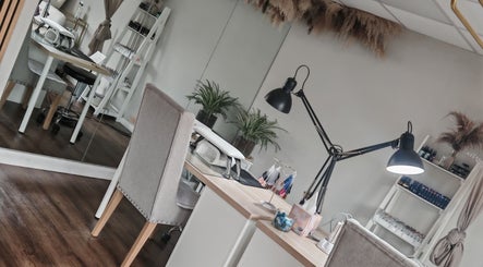 Elegant nail studio at Silk Skin & Wellness Clinic, Hoveton, England, GB, featuring well-lit manicure stations.