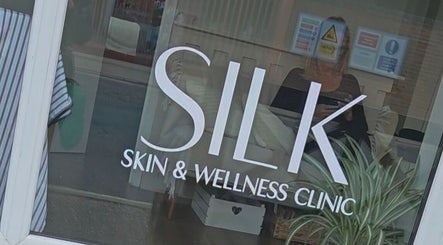 Silk Skin & Wellness Clinic entrance showcasing welcoming decor in Hoveton, England, GB.