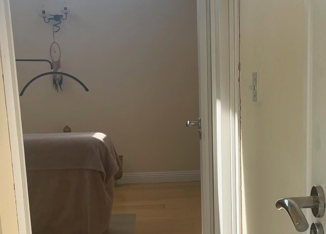 LC Beauty Lounge massage room in Locks Heath, England, GB, with soft lighting and a cozy massage bed.