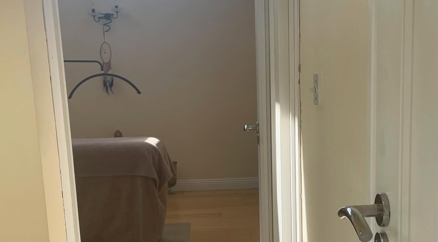 LC Beauty Lounge massage room in Locks Heath, England, GB, with soft lighting and a cozy massage bed.