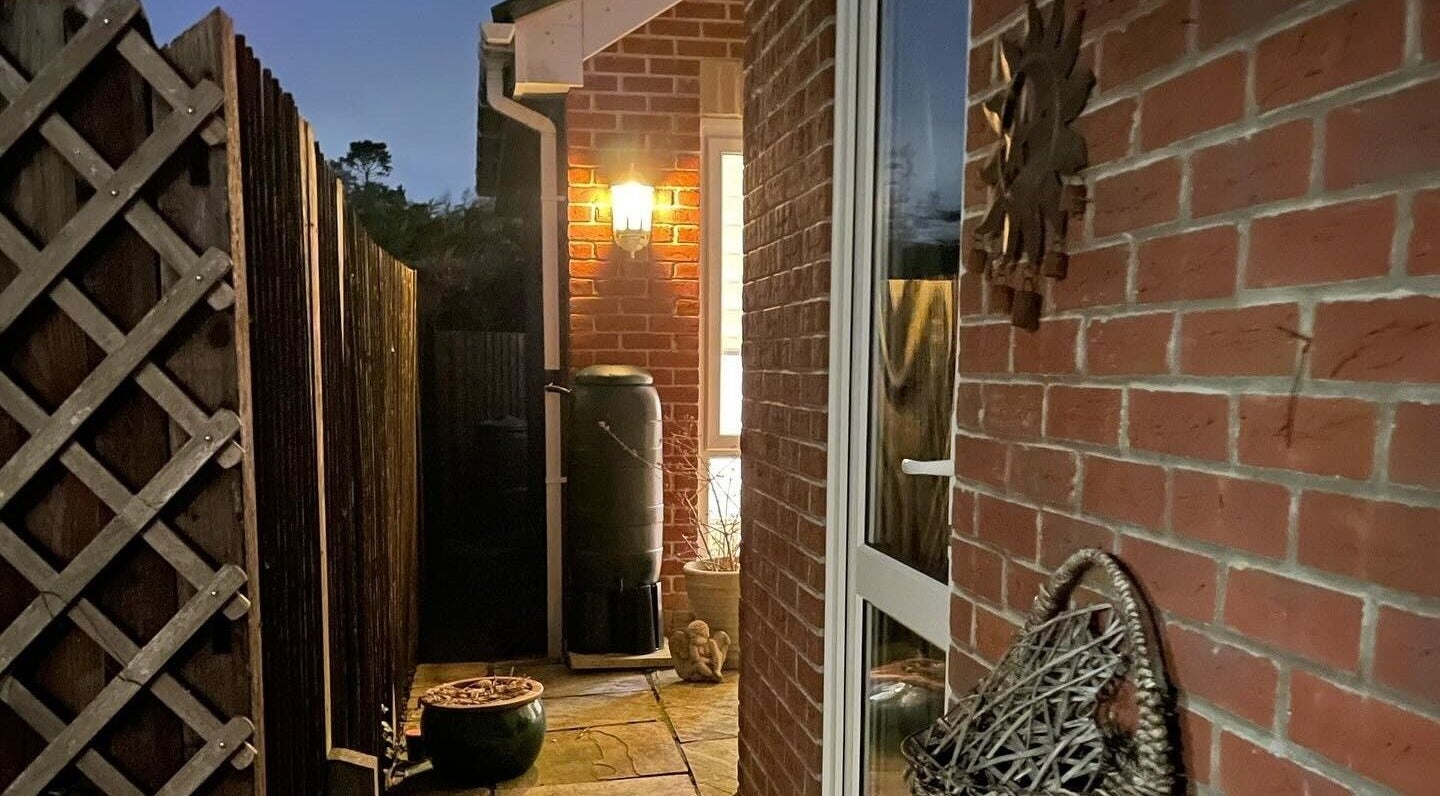 Evening view of LC Beauty Lounge's cozy courtyard in Locks Heath, England, GB.