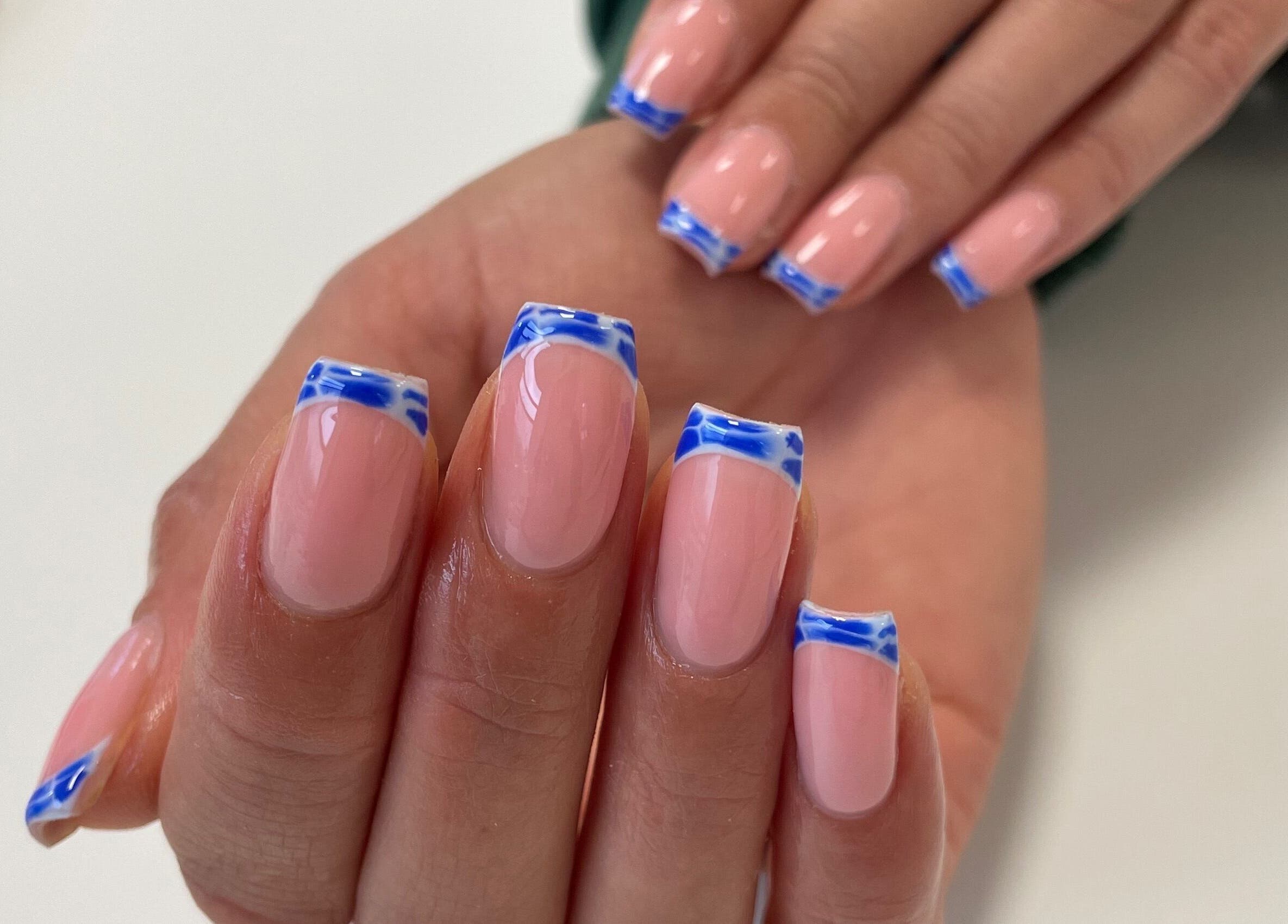 Elegant blue French manicure by Nails By Lois, Glasgow, Scotland, GB, showcasing perfect nail artistry.
