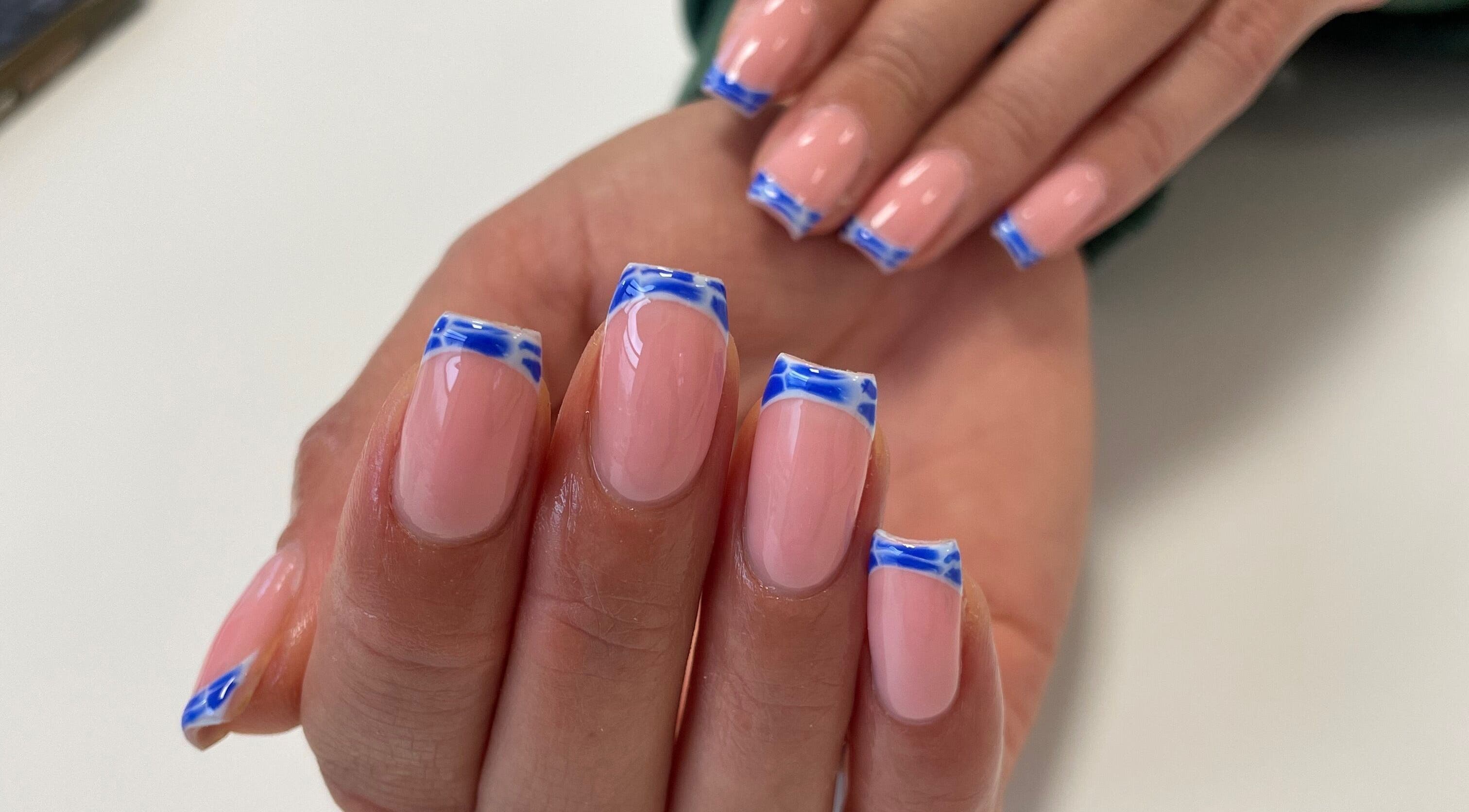 Elegant blue French manicure by Nails By Lois, Glasgow, Scotland, GB, showcasing perfect nail artistry.