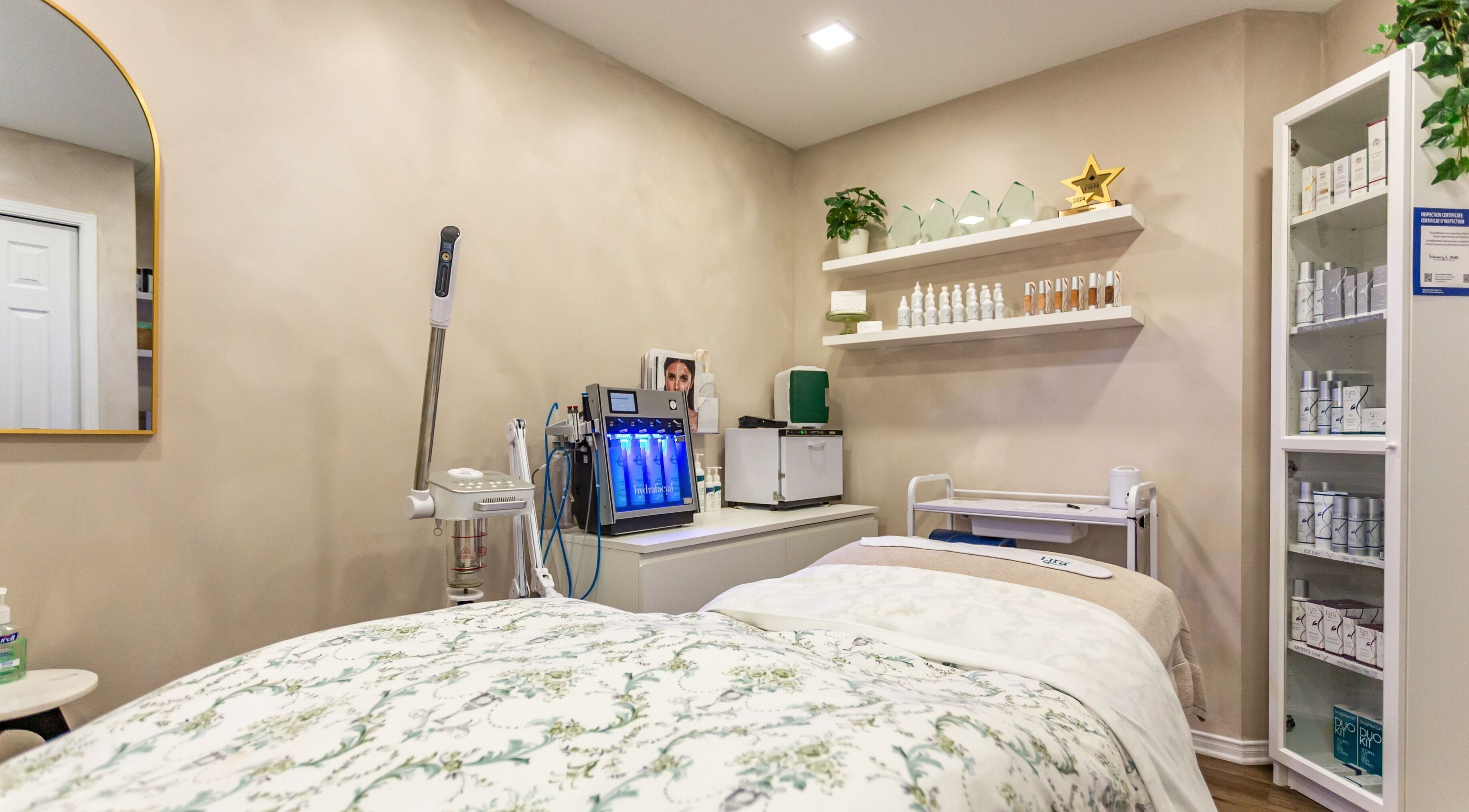 Relaxing treatment room at STUDIODERMA in Ottawa, Ontario, CA featuring serene decor and advanced skincare equipment.
