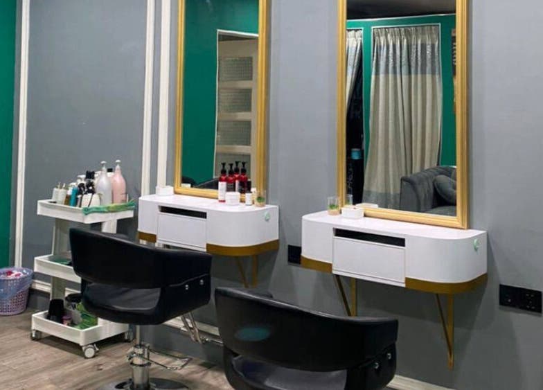 Modern salon styling area at Beylla Medispa Klang located in Klang, Selangor, MY, with sleek design and mirrors.
