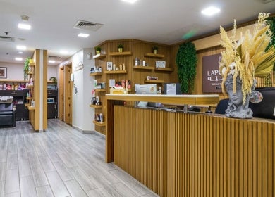 Reception and salon interior at La Poupee Home Service - Abu Dhabi, showcasing elegant design. Abu Dhabi, Abu Dhabi, AE.