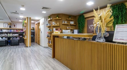 Reception and salon interior at La Poupee Home Service - Abu Dhabi, showcasing elegant design. Abu Dhabi, Abu Dhabi, AE.