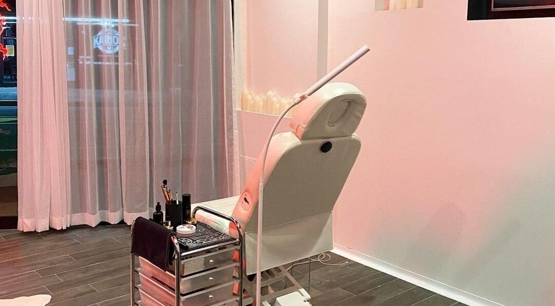 Calming treatment room at Killa Beauty, Long Jetty, NSW featuring a plush chair and elegant decor.