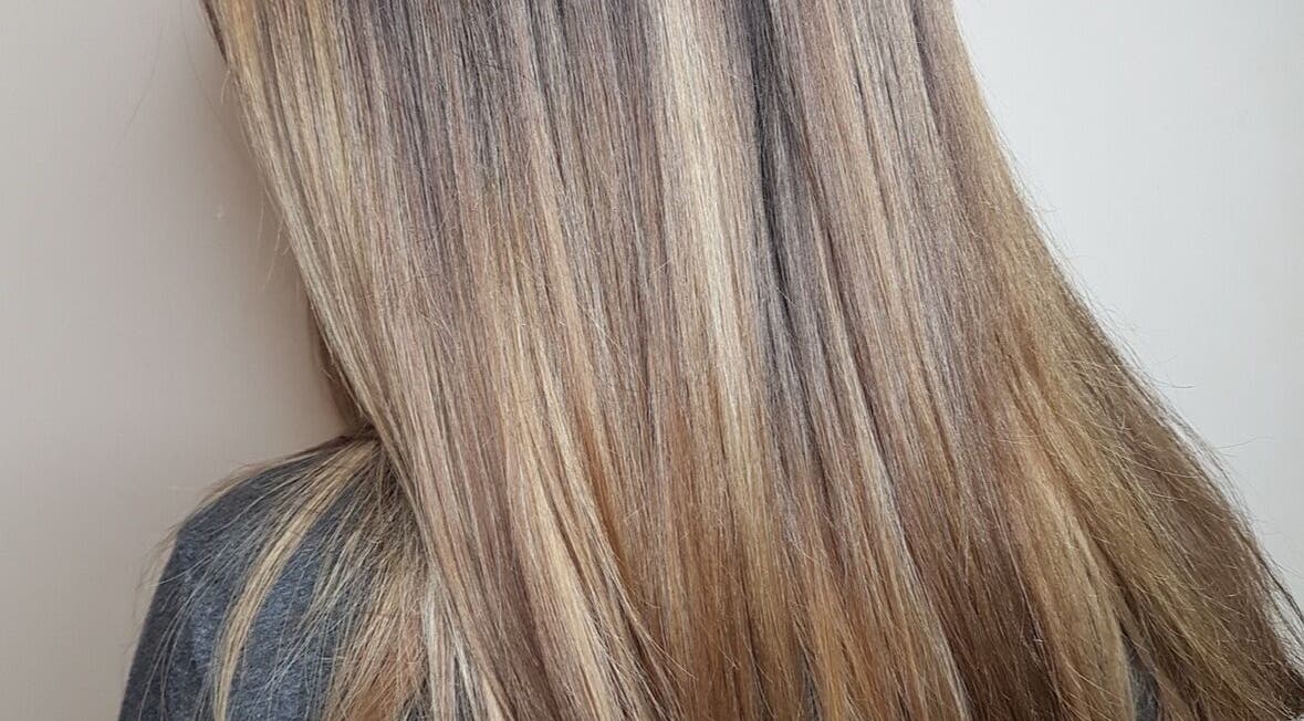 Smooth, lustrous hair styled at Frankie Artistry, Great Missenden, England, GB for a refined look.