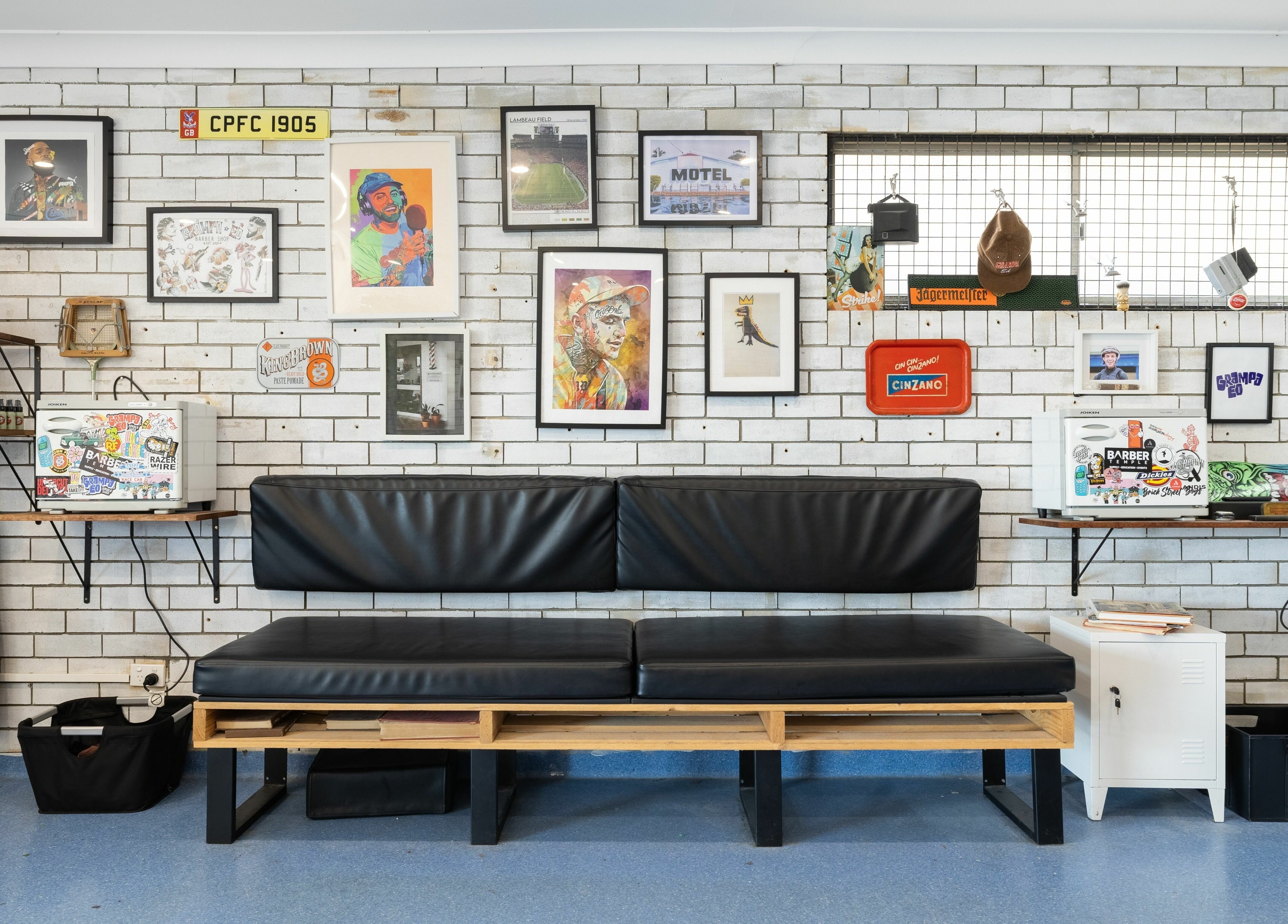 Trendy interior of Grampa Ed in Banora Point, NSW, showcasing eclectic decor and modern seating.